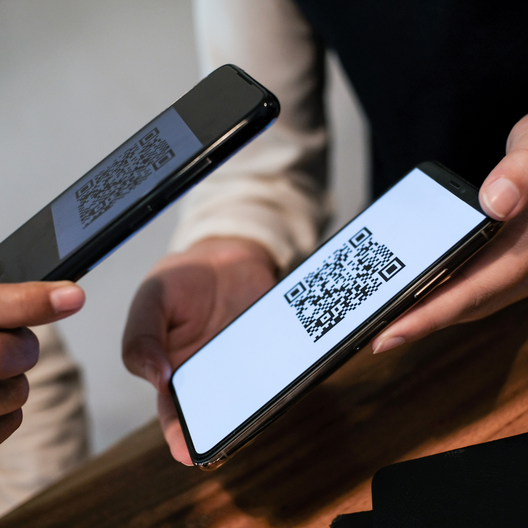 Mobile device interacting with an interactive signage display in a retail store