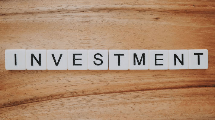 "Investment" in Scrabble tiles