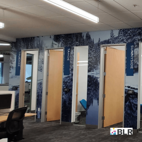 Winter-Themed Vinyl Wall Wraps Create Seamless Continuity Around Individual Call Rooms in Corporate Office Winter-Themed Vinyl Wall Wraps Create Seamless Continuity Around Individual Call Rooms in Corporate Office