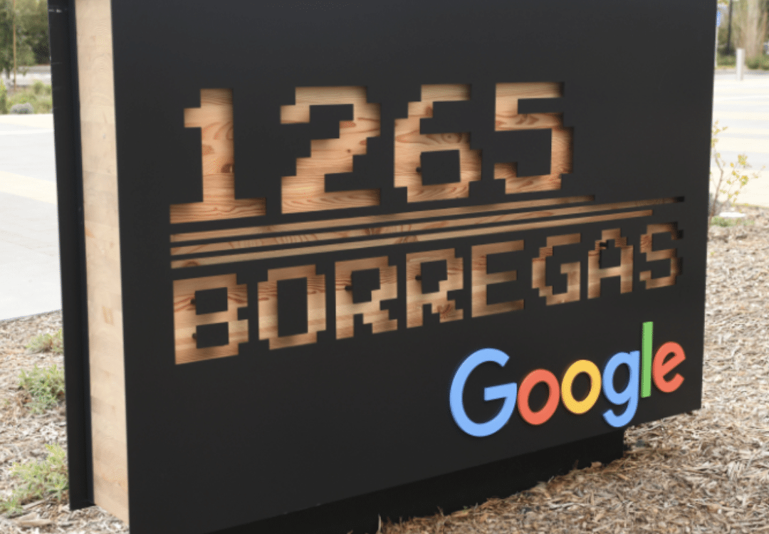 Google’s custom-routed address monument sign juxtaposes the sleekness of the digital world with the timeless allure of timber craftsmanship.