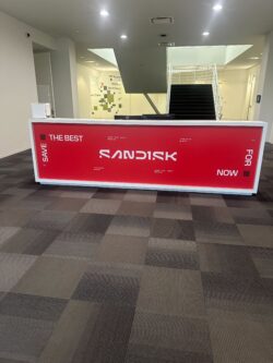 SanDisk's rebrand with interior branding for reception desk by BLR Visual Communications - commercial business signs