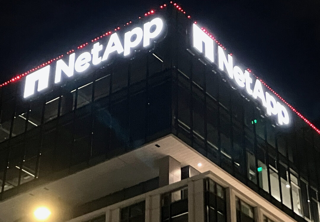 Channel Letter Signs on NetApp Storefront at Night