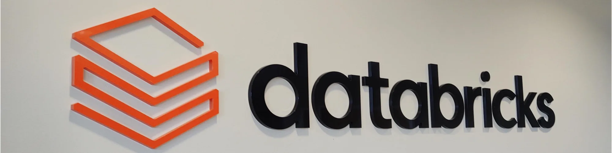 Branded office lobby wall signage by BLR Visual Communications